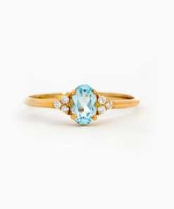 Ring in geel goud 18 kt met diamant en topaas